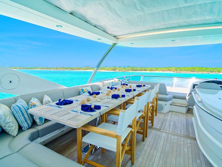 DADDY'S $ - Sunseeker 75 ft.,flybridge seating lounge with long table DADDY'S $ - Sunseeker 75 ft.,flybridge seating lounge with long table