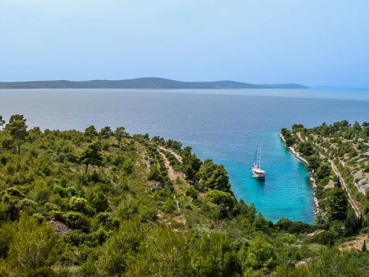 ANDI STAR Custom Gulet 26m - anchored near an island ANDI STAR Custom Gulet 26m - anchored near an island