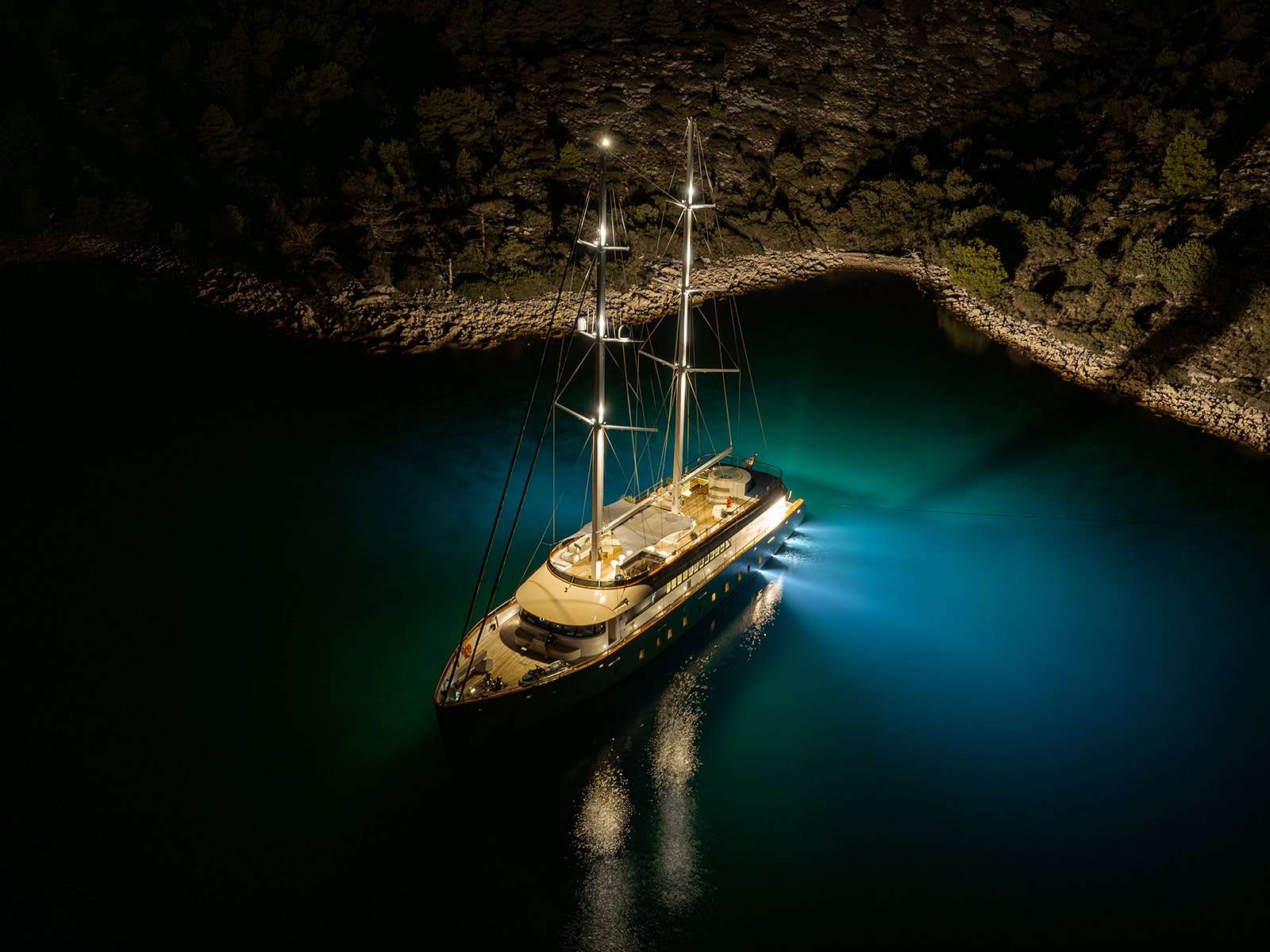 MAXITA Custom Sailing Yacht 39m - anchored at night with the underwater lights on