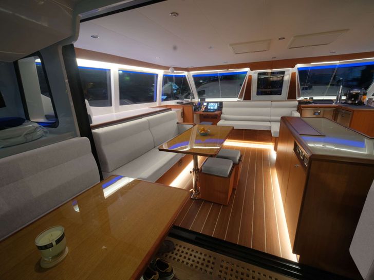 SERENITY - Morrelli Mel 50,dining area and galley SERENITY - Morrelli Mel 50,dining area and galley