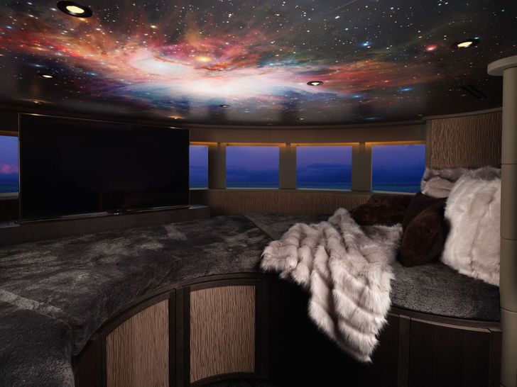 GALAXY - Benetti 56 m,entertainment area with light projector displaying the galaxy GALAXY - Benetti 56 m,entertainment area with light projector displaying the galaxy