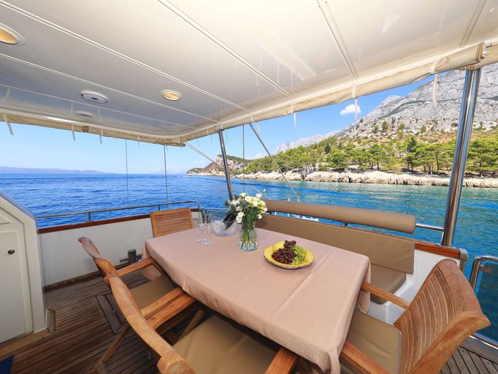 CUSTOM BLANKA Custom Built Aluminum Cutter 22m - aft deck dining CUSTOM BLANKA Custom Built Aluminum Cutter 22m - aft deck dining