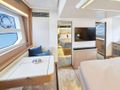 PRESTIGE 590 SHAFT Jeanneau Prestige 590 Fly - master cabin seating and TV PRESTIGE 590 SHAFT Jeanneau Prestige 590 Fly - master cabin seating and TV
