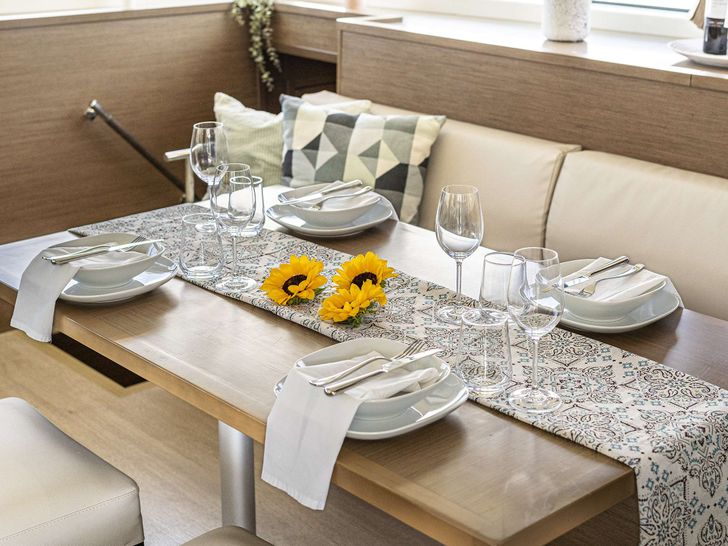 TAMIRO Lagoon 52 - indoor dining set up TAMIRO Lagoon 52 - indoor dining set up