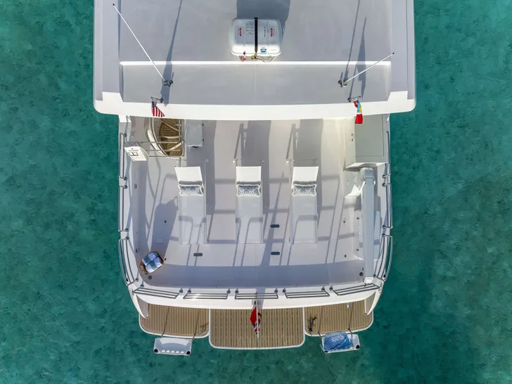 OMAKASE Horizon PC68 - Aerial Stern View OMAKASE Horizon PC68 - Aerial Stern View