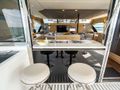 PAINTED PELICAN Aquila 54 - Galley Window with Seating PAINTED PELICAN Aquila 54 - Galley Window with Seating