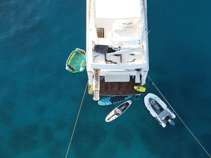 FLOW Ferretti 68 - top aft shot with the water toys FLOW Ferretti 68 - top aft shot with the water toys