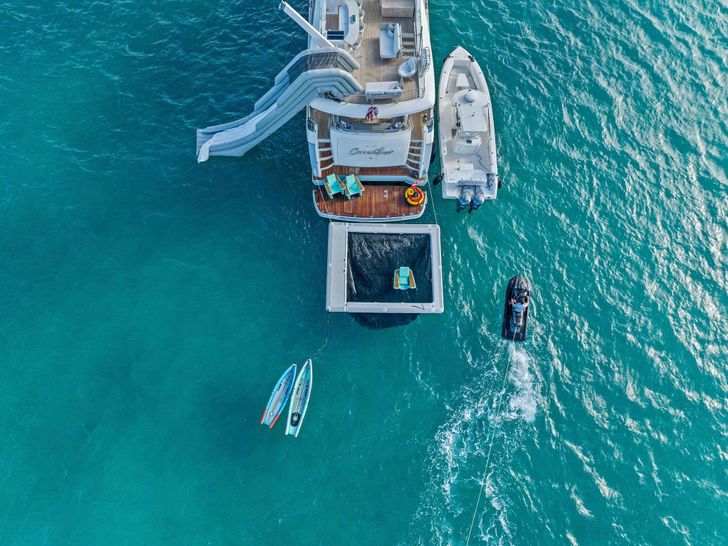 CURRENT $SEA - Princes Viking 95,aerial shot of the stern with water toys CURRENT $SEA - Princes Viking 95,aerial shot of the stern with water toys
