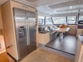 ENDLESS BEAUTY - Fountaine Pajot 44,fridge and dining area