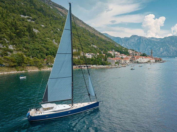 GRATEFUL CNB Bordeaux 76 sailing near an island