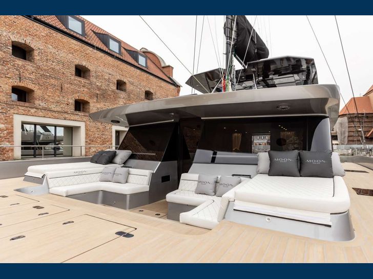 POSEIDON'S FORTUNE - Moon Yacht 65,foredeck lounge and bronzing area