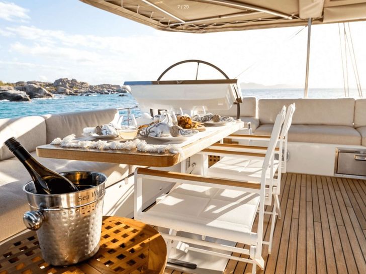 AKASHA Lagoon 620 - flybridge wine party AKASHA Lagoon 620 - flybridge wine party