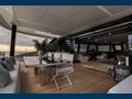 XMOTION - Sunreef 80,aft deck lounging and alfresco dining area