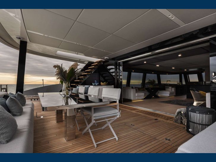 XMOTION - Sunreef 80,aft deck lounging and alfresco dining area