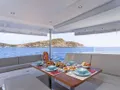 HELIDONI Fountaine Pajot Tanna 47 - flybridge lounge and dining area HELIDONI Fountaine Pajot Tanna 47 - flybridge lounge and dining area