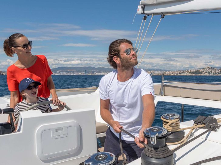 RISE Fountaine Pajot Astrea 42 captain manning the sail