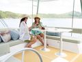 BORROWED BOUNTY Bali 4.8 Open Space - guests on the flybridge BORROWED BOUNTY Bali 4.8 Open Space - guests on the flybridge