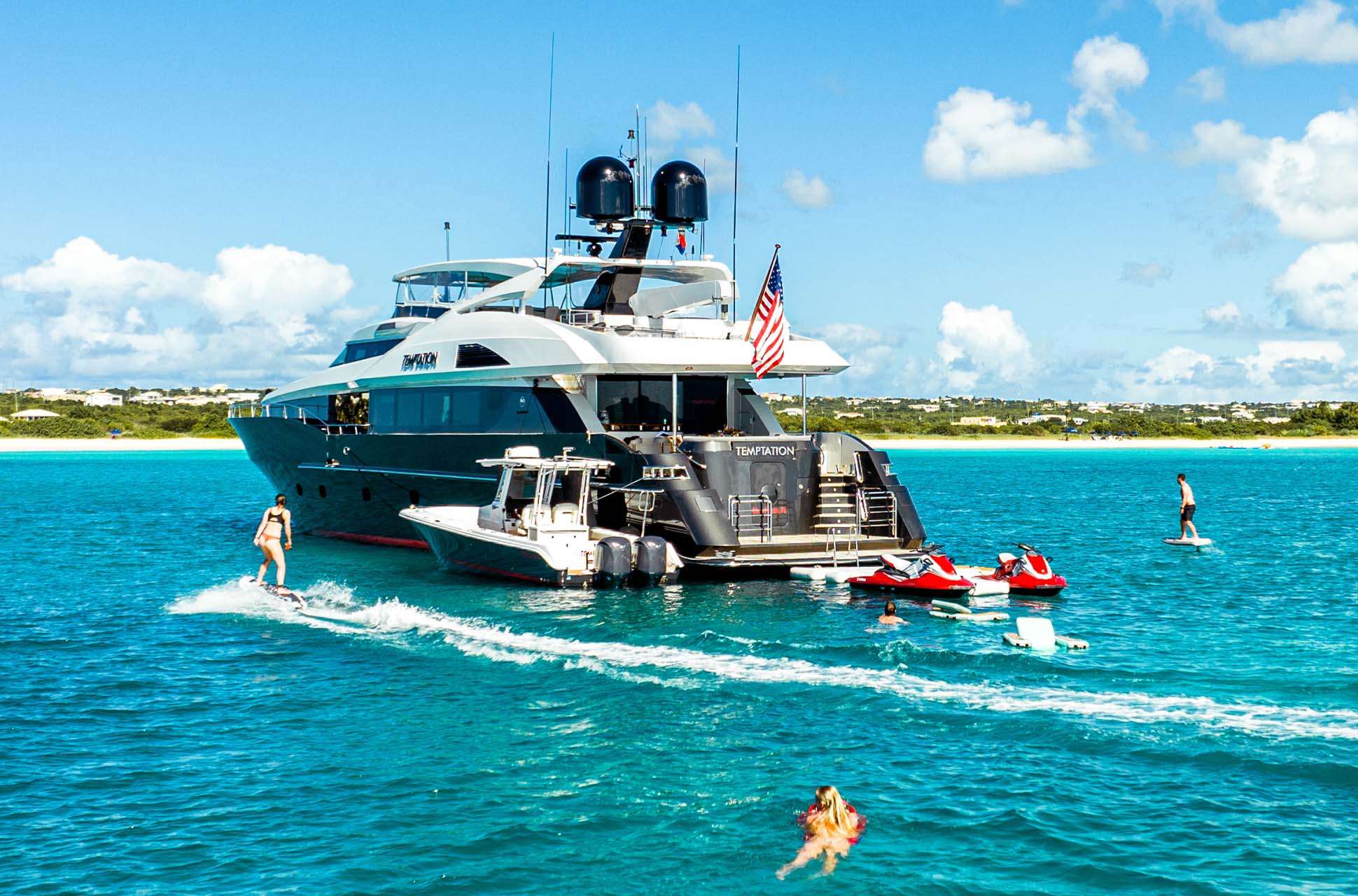 TEMPTATION Palmer Johnson 123 - aft shot with water activities