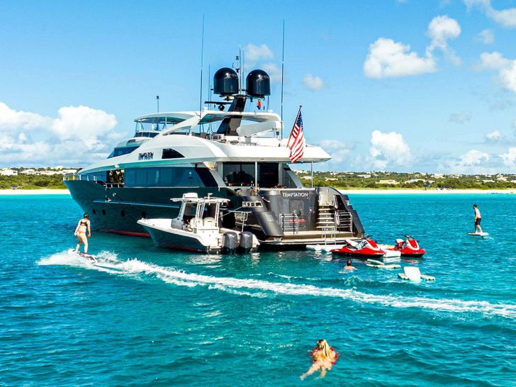 TEMPTATION Palmer Johnson 123 - aft shot with water activities TEMPTATION Palmer Johnson 123 - aft shot with water activities