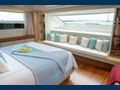 GOLDEN YACHT Sanlorenzo SL104 master cabin bed and seating area