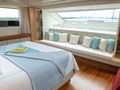 GOLDEN YACHT Sanlorenzo SL104 master cabin bed and seating area