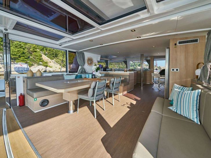 NONAME Bali 5.4 - saloon and dining area connecting to the aft deck NONAME Bali 5.4 - saloon and dining area connecting to the aft deck