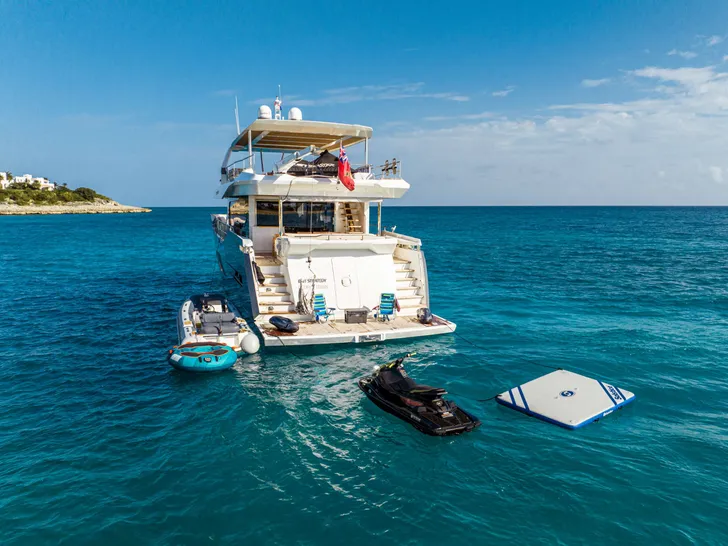 EXIT STRATEGY Numarine 26 XP - aft shot with the water toys EXIT STRATEGY Numarine 26 XP - aft shot with the water toys