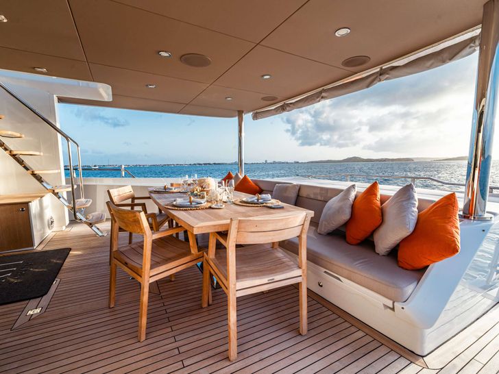 EXIT STRATEGY Numarine 26 XP - main aft deck seating lounge and dining area EXIT STRATEGY Numarine 26 XP - main aft deck seating lounge and dining area