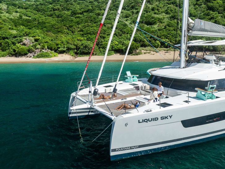 LIQUID SKY Fountaine Pajot Alegria 67 - anchored foredeck view LIQUID SKY Fountaine Pajot Alegria 67 - anchored foredeck view