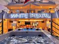 WHITE PEARL Custom Yacht 56m - aft deck lights at night WHITE PEARL Custom Yacht 56m - aft deck lights at night