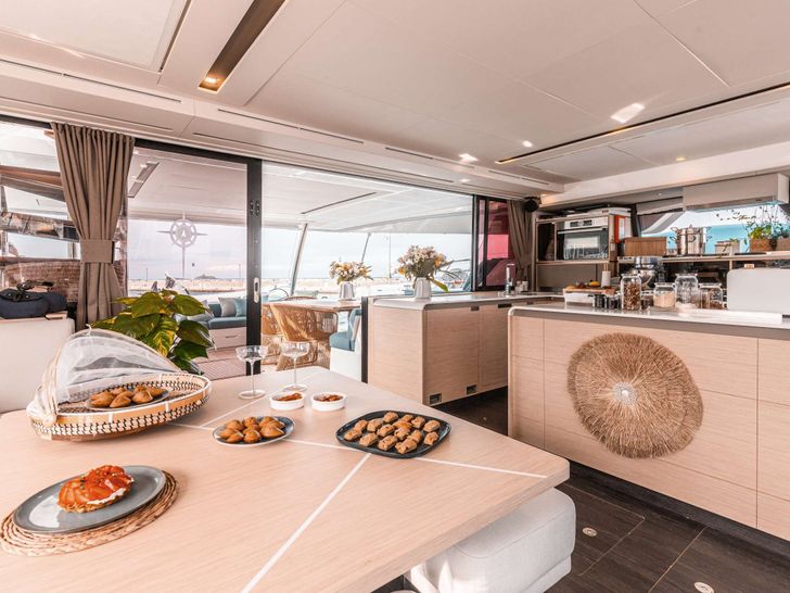 THE BLUE DREAM Fountaine Pajot 67 - indoor dining area THE BLUE DREAM Fountaine Pajot 67 - indoor dining area