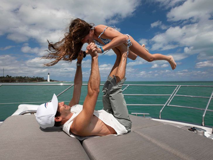 GEISHA Azimut 60 Fly - guests on the foredeck GEISHA Azimut 60 Fly - guests on the foredeck