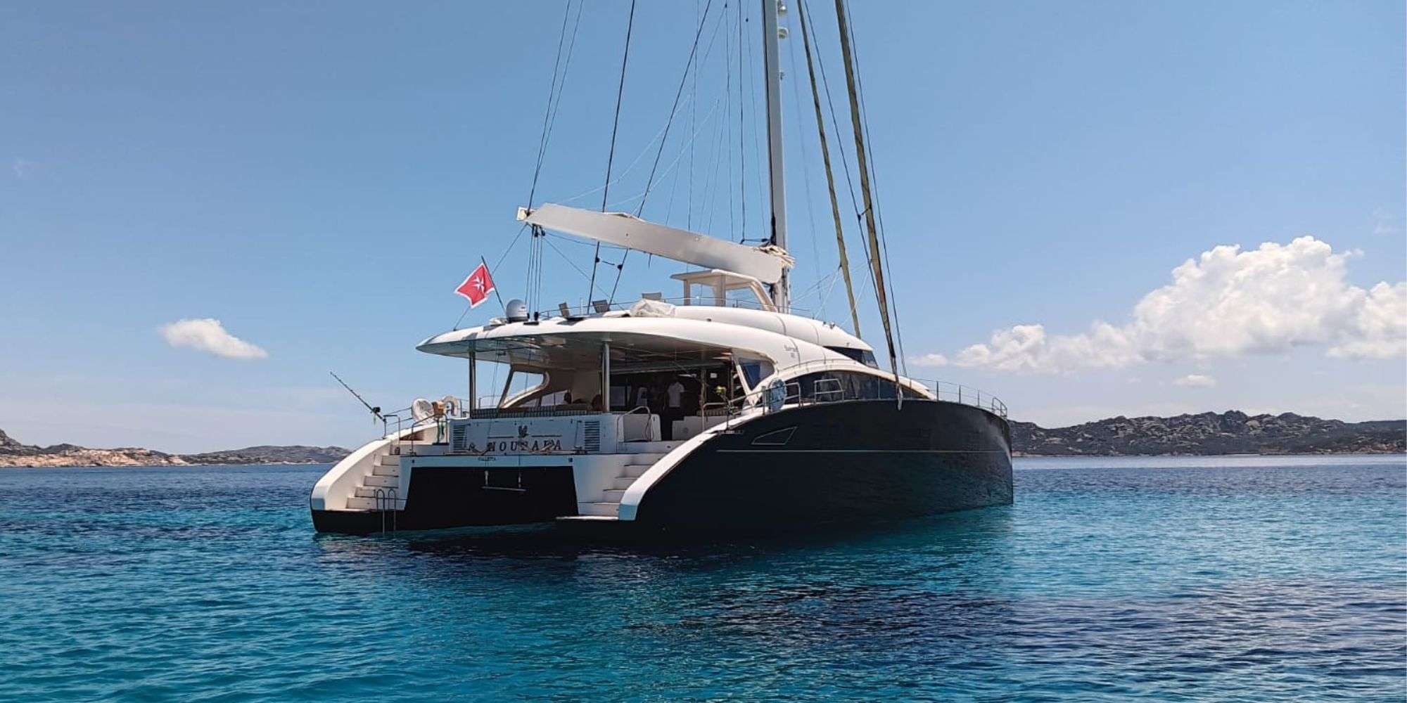 HOUBARA Sunreef 82 DD - anchored aft view