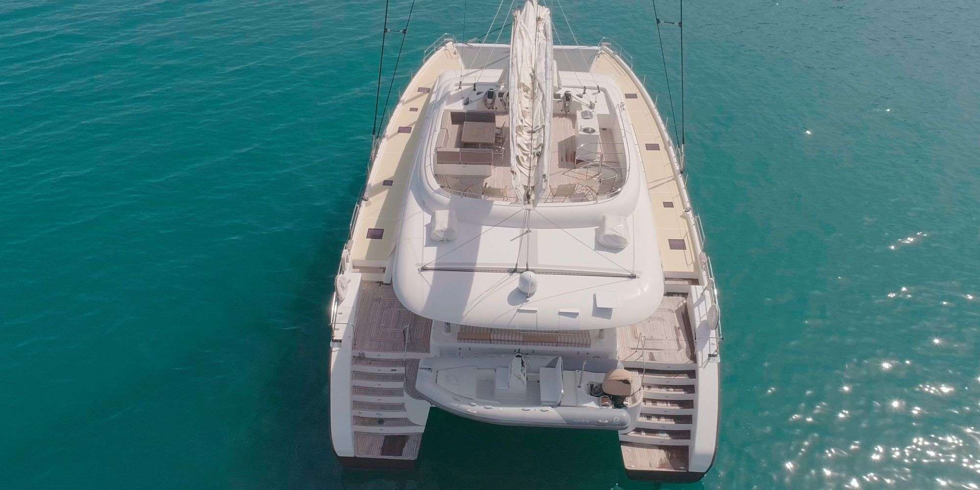 HOUBARA Sunreef 82 DD - aerial anchored shot