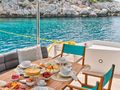 M FIVE Sunseeker 75 Yacht - alfresco dining set up M FIVE Sunseeker 75 Yacht - alfresco dining set up