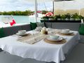 AWATEA Custom Catamaran 63ft - alfresco dining area AWATEA Custom Catamaran 63ft - alfresco dining area