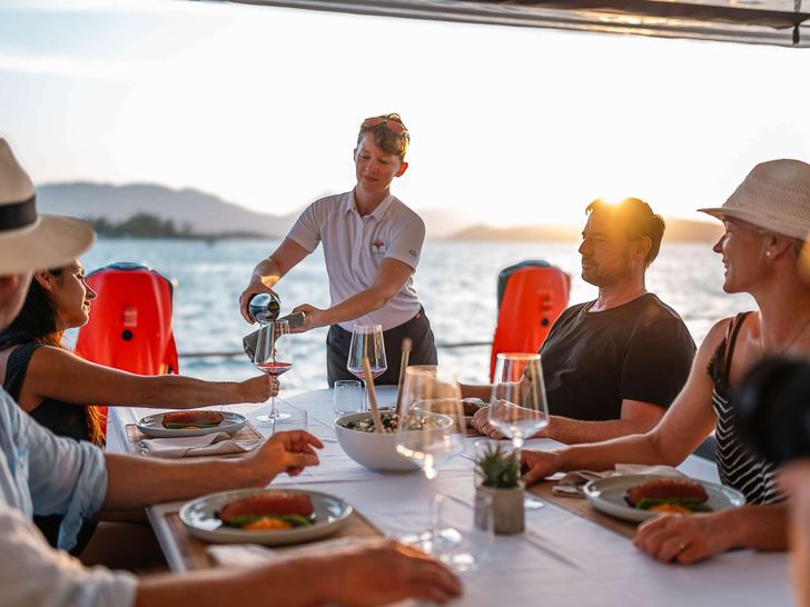 VALINOR(Mediterranean)Lagoon 55 - guests dining alfresco VALINOR(Mediterranean)Lagoon 55 - guests dining alfresco