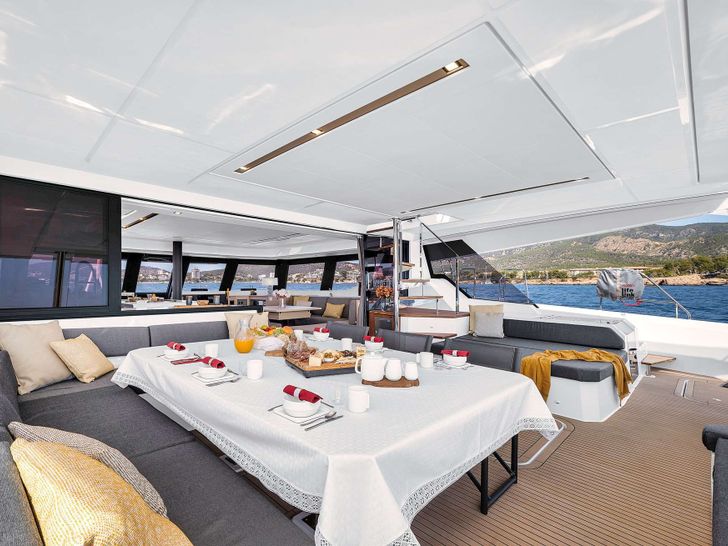 NEOW Fountaine Pajot Alegria 67 - aft deck alfresco dining area NEOW Fountaine Pajot Alegria 67 - aft deck alfresco dining area