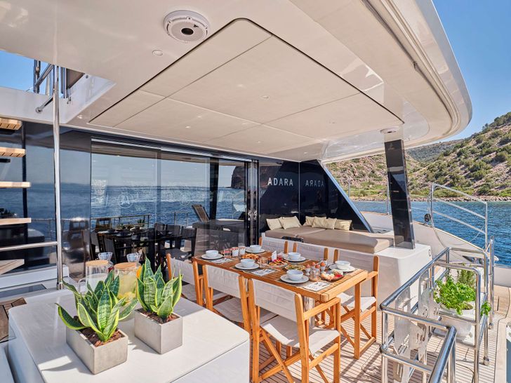 ADARA Sunreef 50 - aft deck dining set up ADARA Sunreef 50 - aft deck dining set up