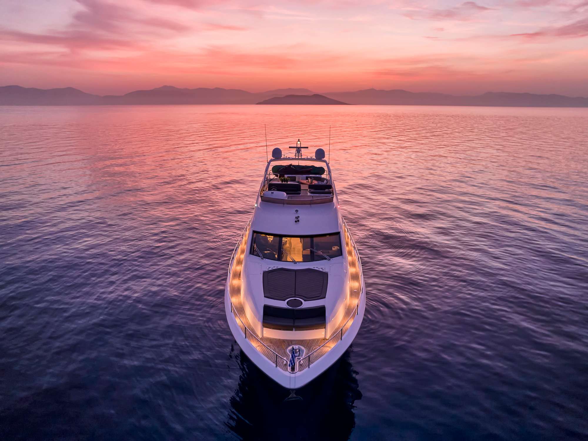 M FIVE Sunseeker 75 Yacht - foredeck shot under the sunset