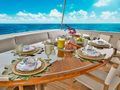 BIRDIE Broward 110 - aft deck dining set up BIRDIE Broward 110 - aft deck dining set up
