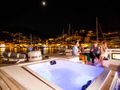 MAJESTY OF GREECE Fountaine Pajot Power 67 - foredeck jacuzzi at night MAJESTY OF GREECE Fountaine Pajot Power 67 - foredeck jacuzzi at night