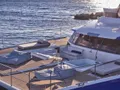 MAJESTY OF GREECE Fountaine Pajot Power 67 - foredeck lounge and jacuzzi MAJESTY OF GREECE Fountaine Pajot Power 67 - foredeck lounge and jacuzzi