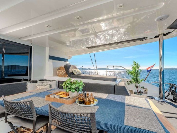 BLACK CAVIAR Lagoon 55 - aft deck dining area BLACK CAVIAR Lagoon 55 - aft deck dining area