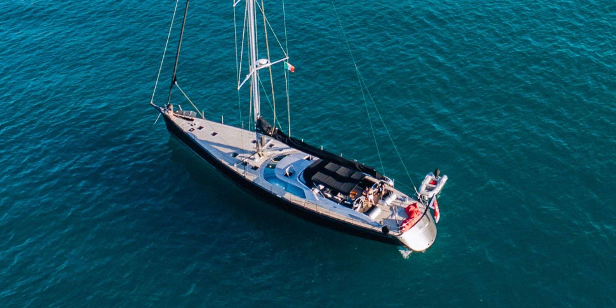 FREE AT LAST Marina 94 - anchored aerial shot