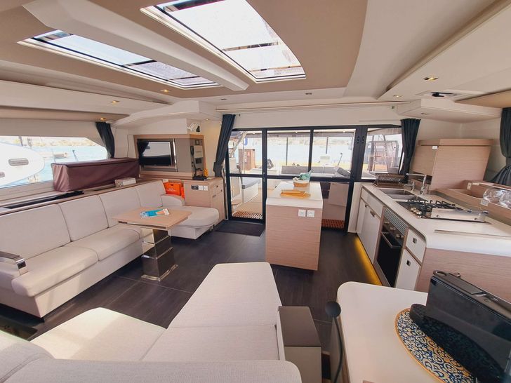 LE GRAND BOGAVANT Fountaine Pajot Aura 51 - saloon seating and galley LE GRAND BOGAVANT Fountaine Pajot Aura 51 - saloon seating and galley