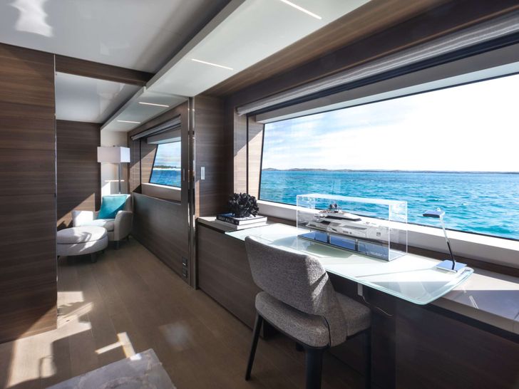 EROS Ferretti Custom Line Navetta 37 - master cabin desk by the window EROS Ferretti Custom Line Navetta 37 - master cabin desk by the window
