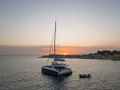 NEW HORIZONS 4 Bali 5.8 - anchored under the sunset NEW HORIZONS 4 Bali 5.8 - anchored under the sunset