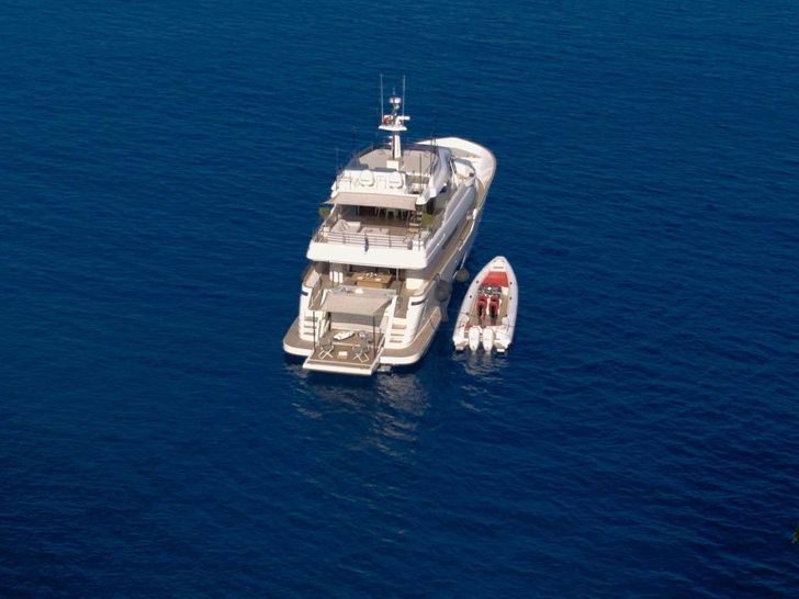 MILENA Custom Line Navetta 28 - aerial aft shot with the tender MILENA Custom Line Navetta 28 - aerial aft shot with the tender