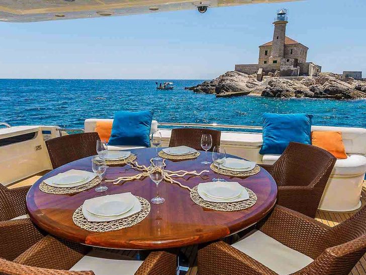 MISS KATARIINA Ferretti 880 - aft deck alfresco dining set up MISS KATARIINA Ferretti 880 - aft deck alfresco dining set up